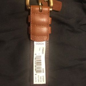Tan Leather Coach Belt . Never worn. Size Large!!